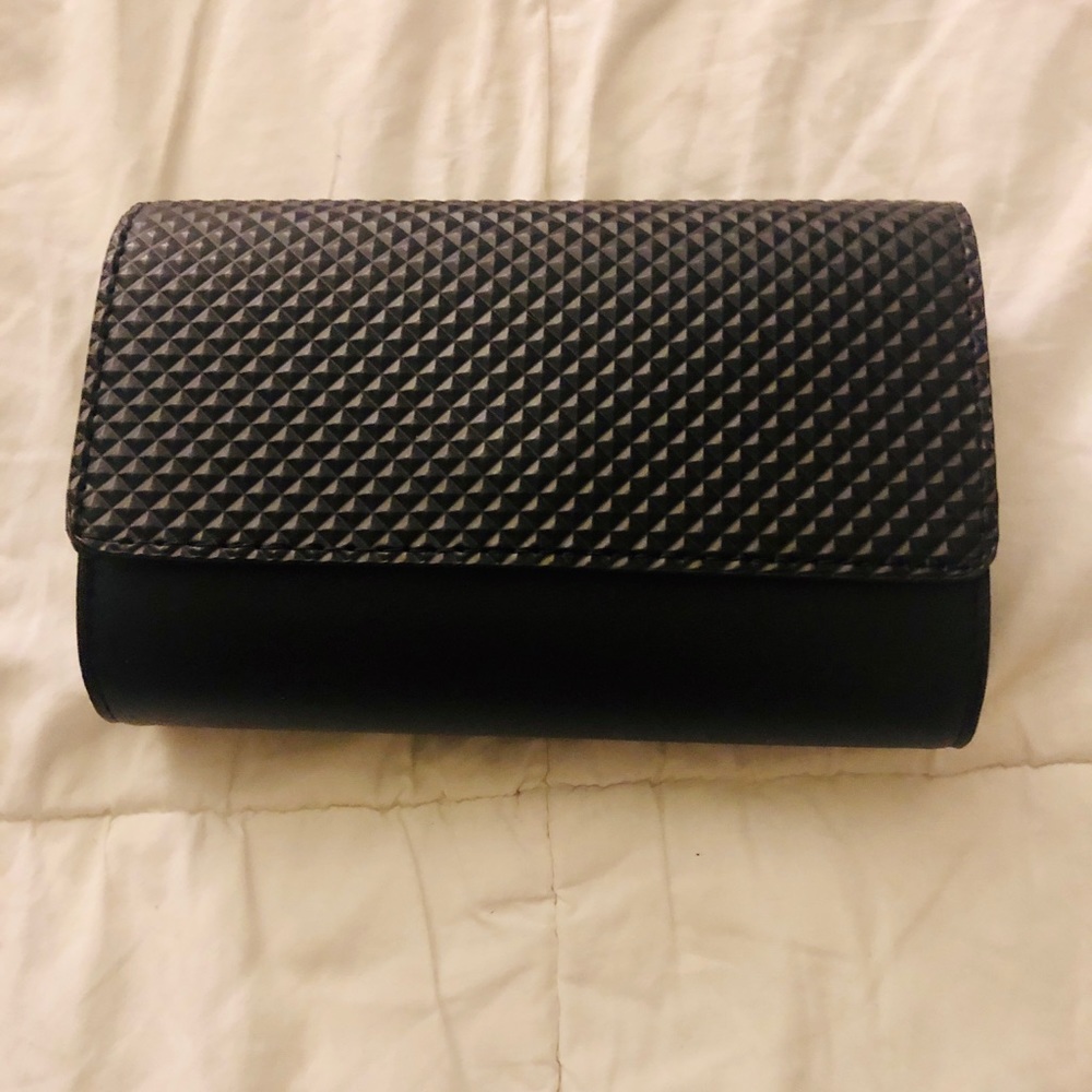 Black clutch with chain. Never been used!